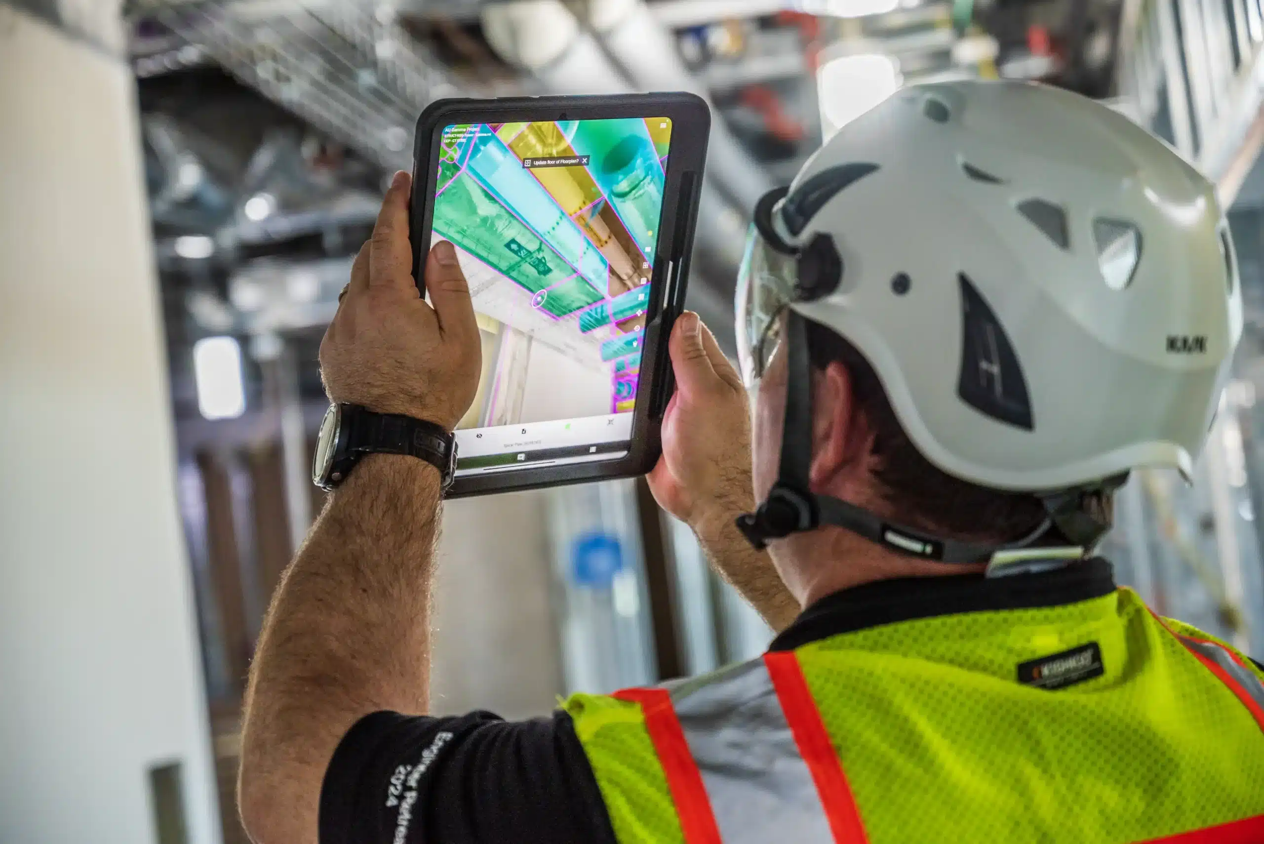 Engineer validating overhead MEP installations against the BIM model in GAMMA AR